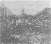 (Bean's barn and scrap pile, circa 1910)